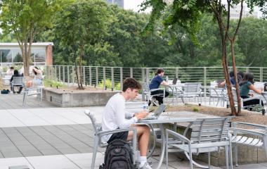 Students studying on the Clough rooftop.