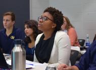 student listens in an SLS course