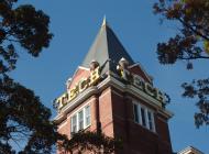 Tech Tower on Georgia Tech's campus set against a blue sky.