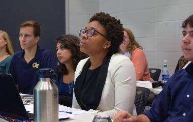 student listens in an SLS course
